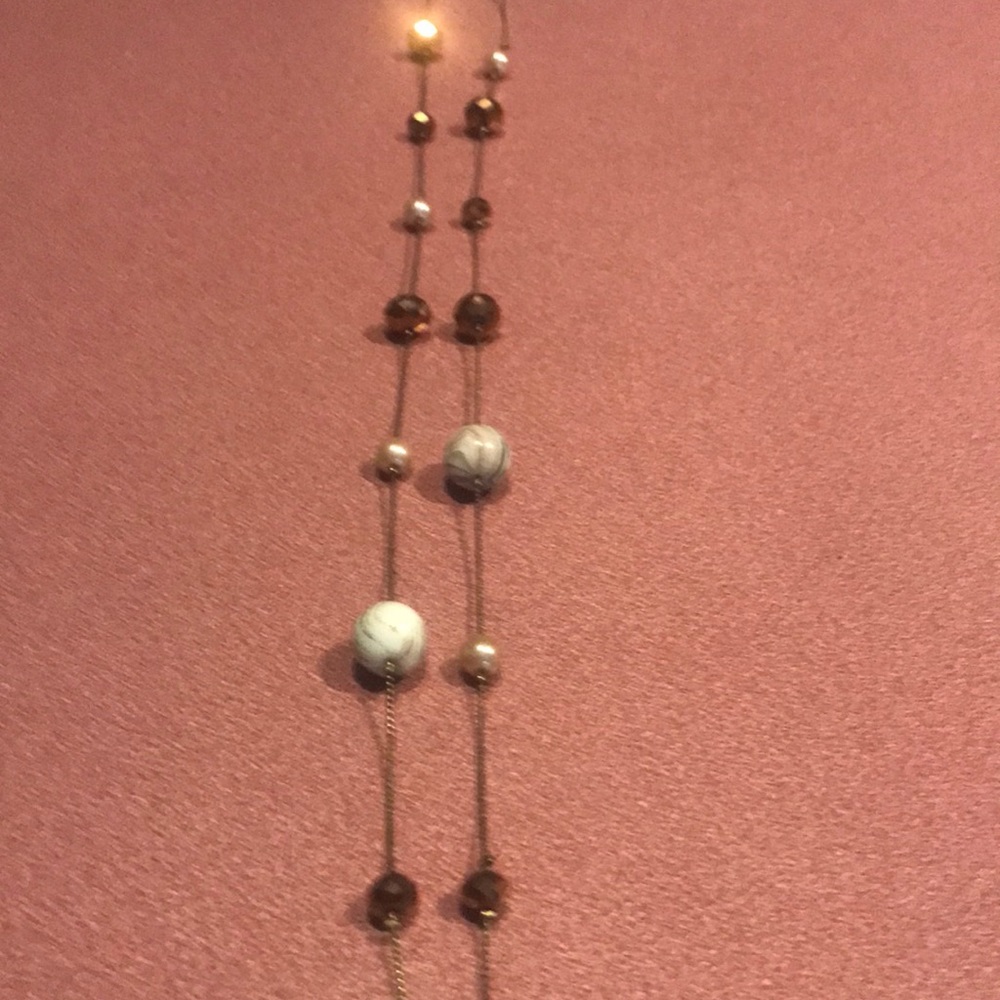 Very long beaded necklace of various patterns see pics